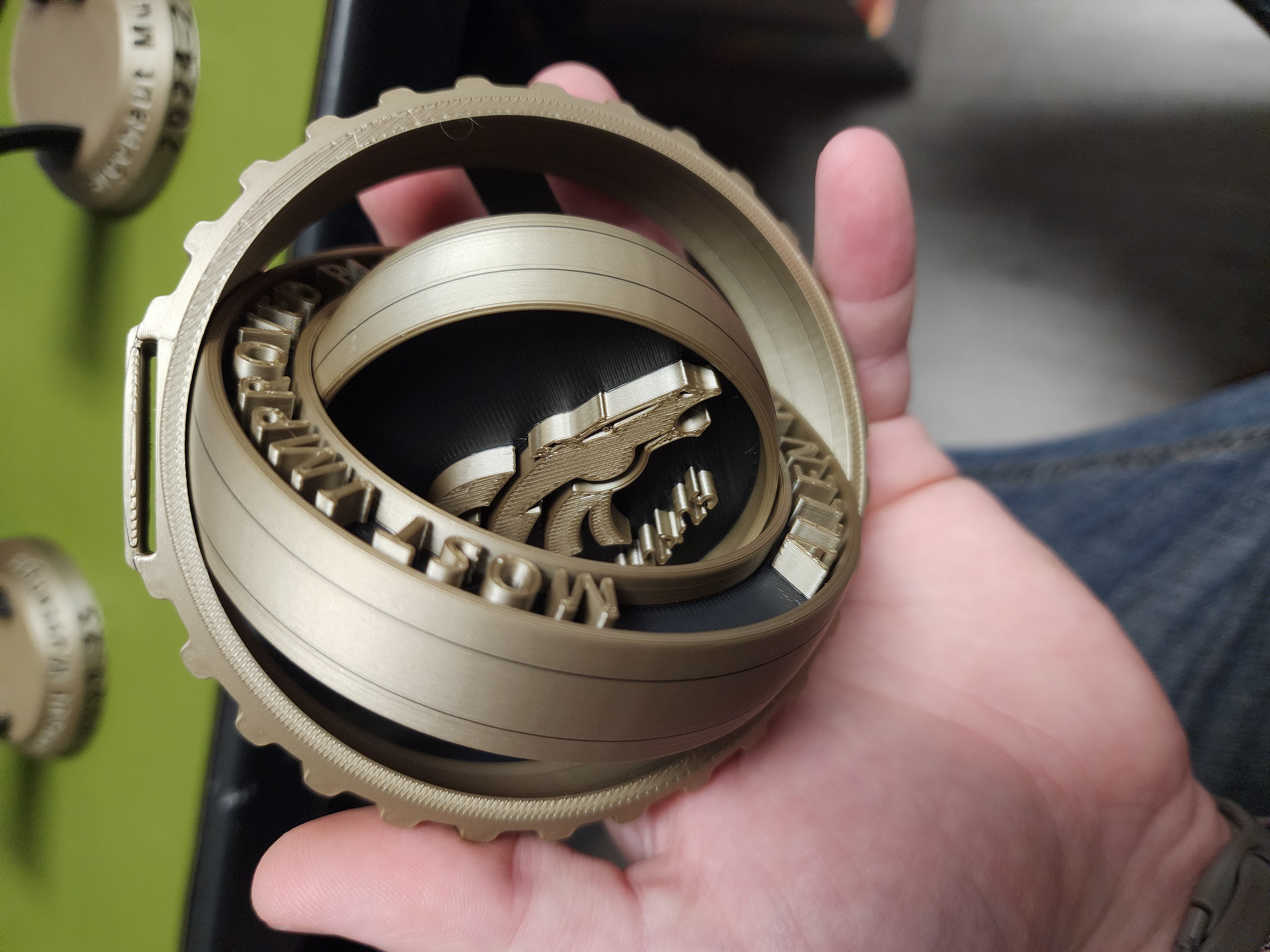 Custom trophy showing its freely rotating internal rings
