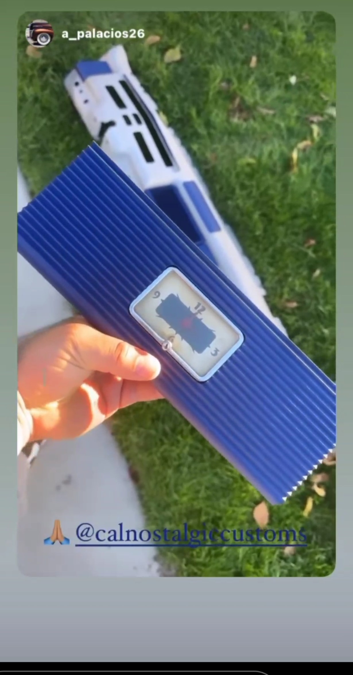 Original clock insert fitted into a blue Mercury glovebox piece