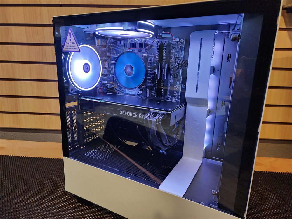 White custom PC build with tempered-glass panel